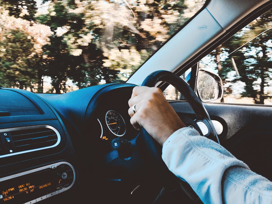 hand on the steering wheel
